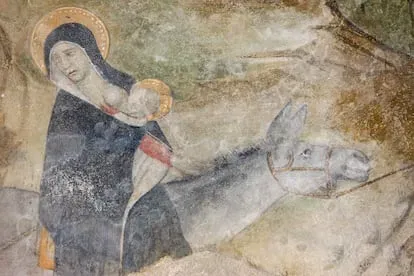Fresco medieval que muestra la huida a Egipto.