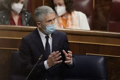 El ministro del Interior, Fernando Grande-Marlaska, interviene en la sesión de control al Gobierno en el Congreso, este 13 de octubre.