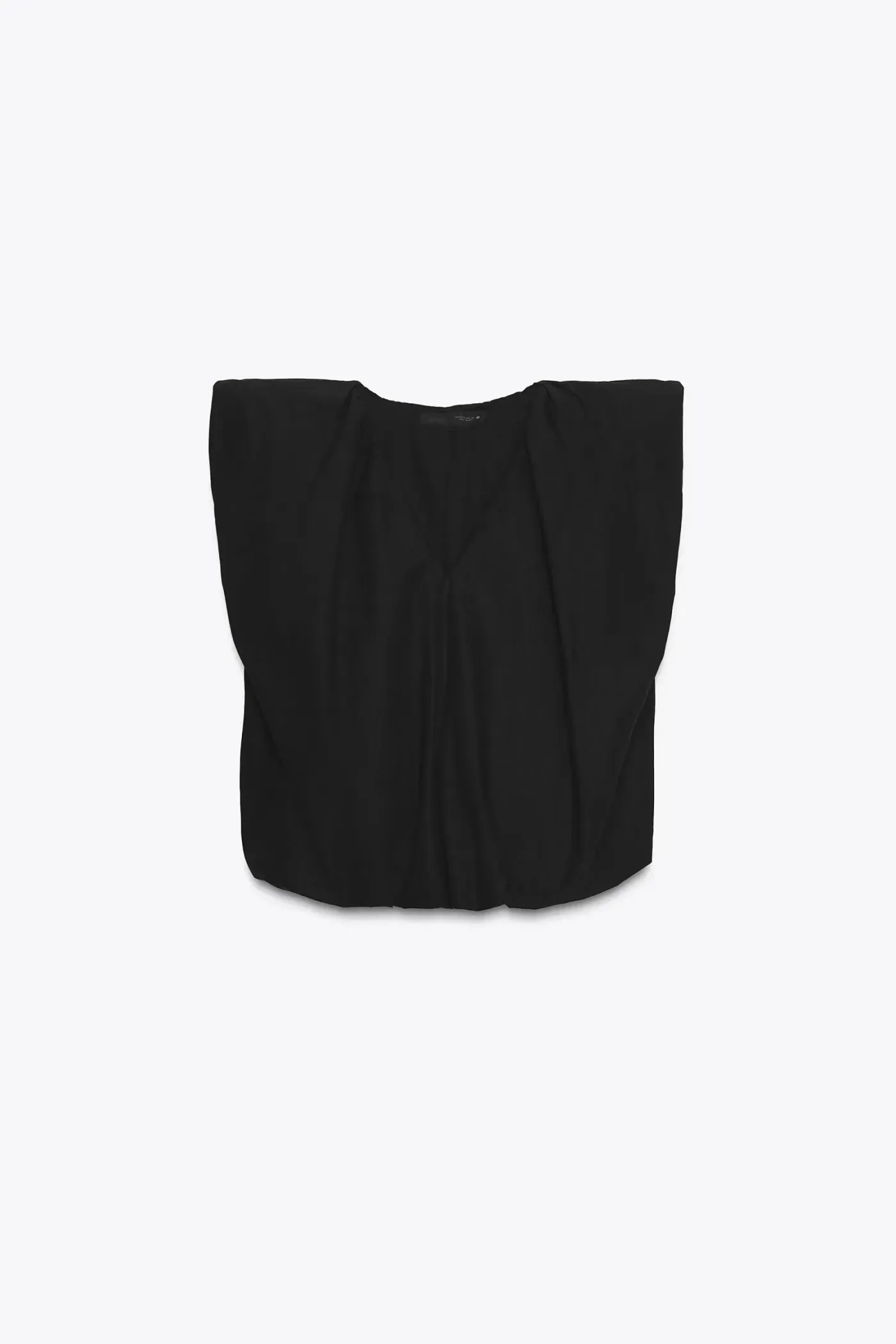 Blusa abullonada en color negro