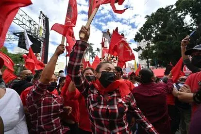 Supporters of the Honduran presidential candidate for the Libertad y Refundacion (LIBRE) party, Xiomara Castro, are seen during the campaign's closing event in Tegucigalpa on November 21, 2021. - Hond