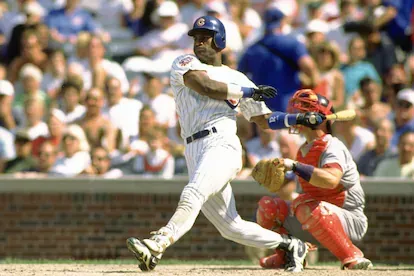 CHICAGO - CIRCA 1997: Sammy Sosa #21 of the Chicago Cubs bats during an MLB game at Wrigley Field in Chicago, Illinois. Sosa played for 18 seasons all with 4 different teams, was a 7-time All-Star and