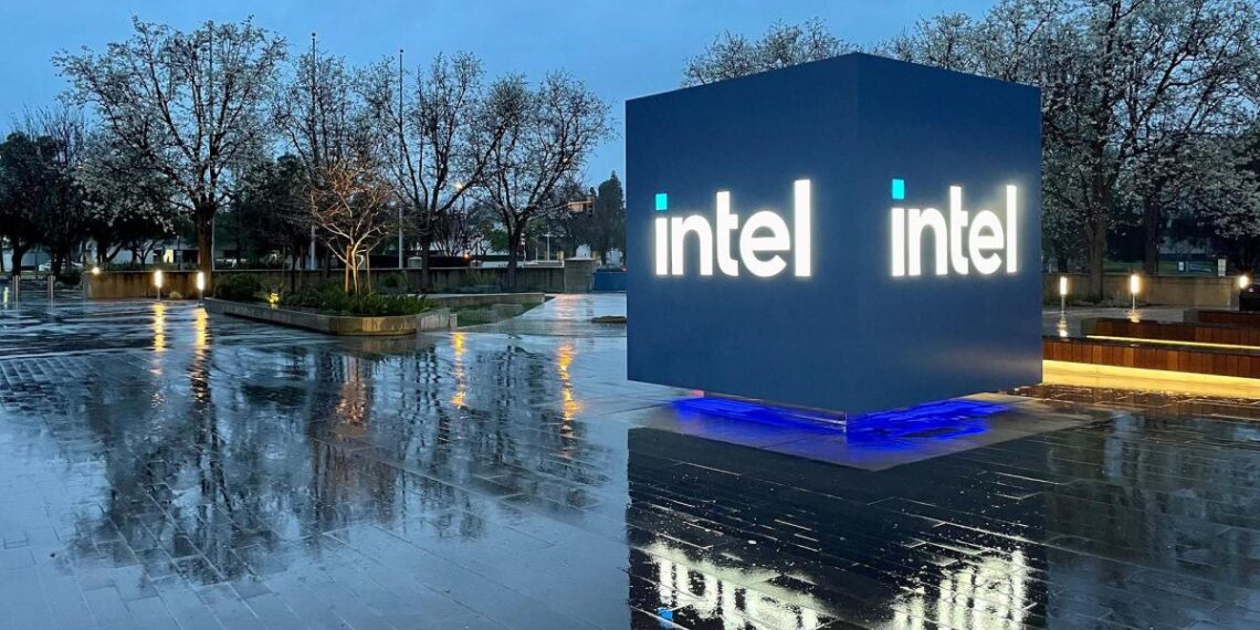 Intel Headquarters Robert Noyce Building in Santa Clara, California at night with Intel sign lit up.