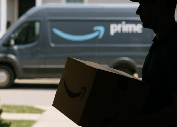 Amazon truck pulling away from San Diego fulfillment center on the way to make a package delivery.