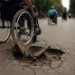 Arruinan baches carrera de competidores en silla de ruedas