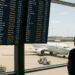 Travellers wait in terminal 4 at Heathrow Airport, west of London on September 20, 2025. Major European airports including Brussels, Berlin and London's Heathrow were Saturday hit by "cyber-related disruption" affecting check-in and baggage drop systems and causing delays, airport service provider Collins Aerospace told AFP.
