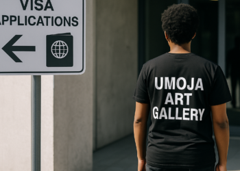 a home with a curved wall with a sign that says Umoja art gallery