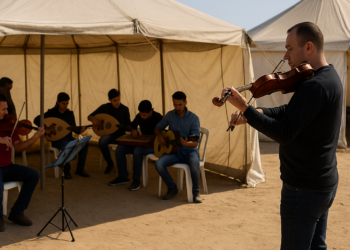 Gaza’s musicians reopen bomb-shattered conservatory – in tents | Gaza