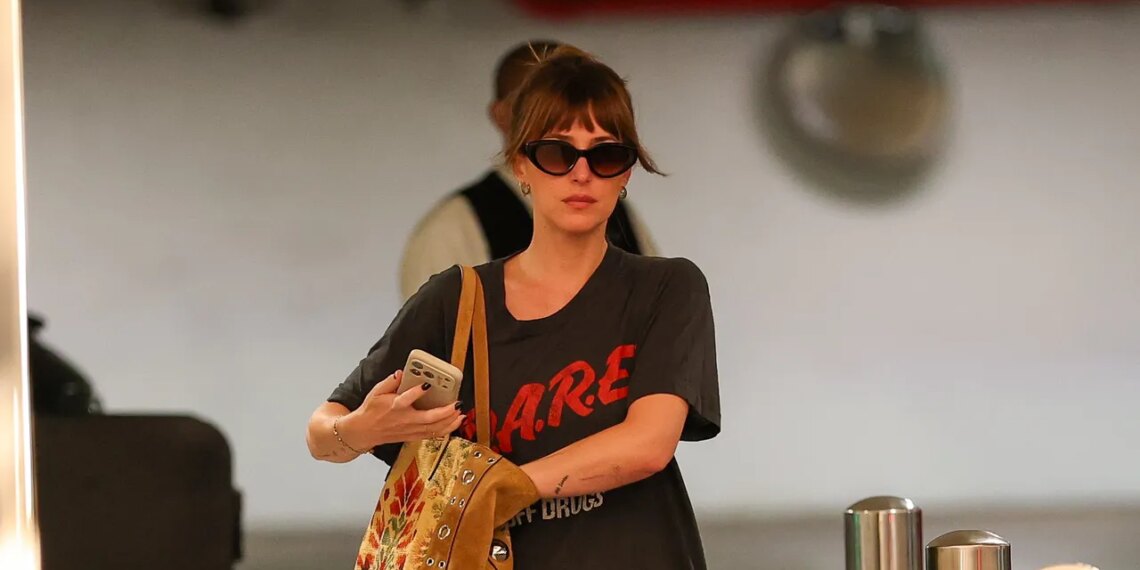 Dakota Johnson Wears an Old Favorite Slogan Shirt for a New Era